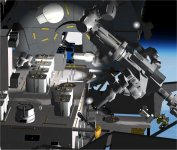 Dextre retrieving MISSE 9 transfer tray.jpg
