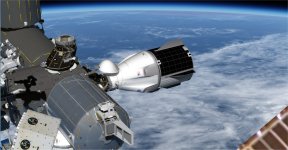 DM-1 Docked to station.jpg