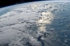 Clouds-Sun-reflection-ISS.JPG