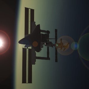 Discovery at ISS Sunset