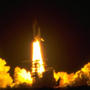 Space shuttle night launch seen from the VIP viewing site.