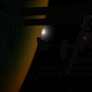 DGIV docked to the ISS at sunrise