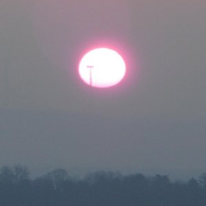Sunrise with wind generator