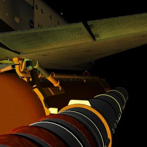 The yellow/orange glow of the SRB's and SSME's exhaust lights up the Orbiter's belly