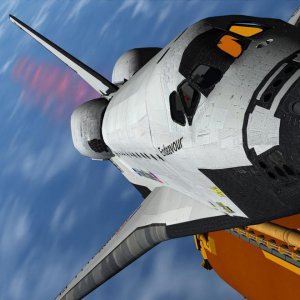 Second stage: the 3 Shuttle Main Engines (the purple exhaust trails are visible behind the orbiter tail section) produce 37 million HP and generate a 