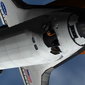 Another close up view during 2nd stage ascent: the huge light/shadow contrast highlights the Orbiter skin details.