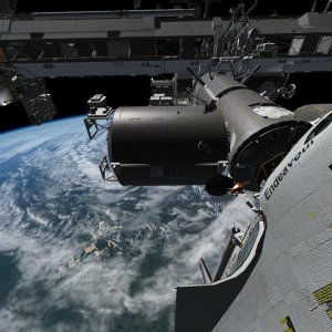 Wide angle view of Endeavour docked to the ISS