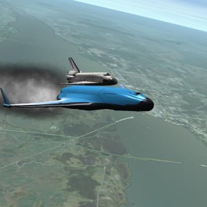 Shuttle Atlantis gets a piggy-back ride from an XR-5 Vanguard.  This XR-5 has been modified by Altea Aerospace to carry the shuttle into orbit.  The p