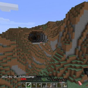 A cave, as seen from the top of the outcropping in the next picture, also west of my new shelter.