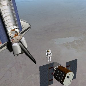 STS 41-C, April 8, 1984.  George "Pinky" Nelson approaches the Solar Maximum satellite.